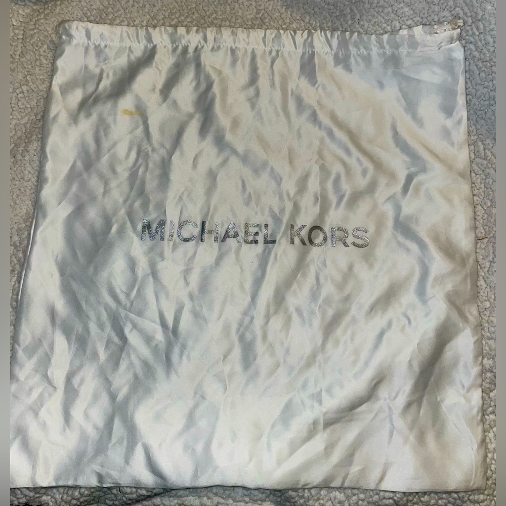Michael Kors garment bag.